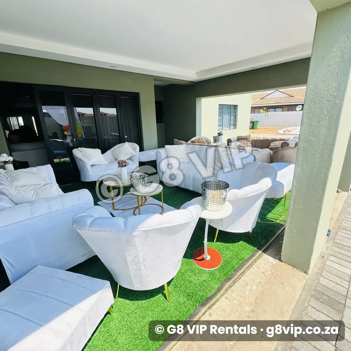 Chillas VIP couch setup with white couches and armchairs