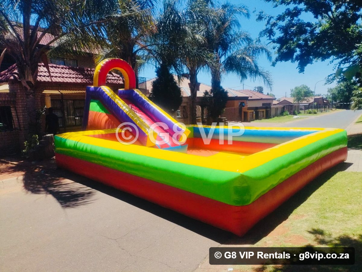 Slide & Pool Castle jumping castle with slide and pool — G8 VIP Rentals Middelburg