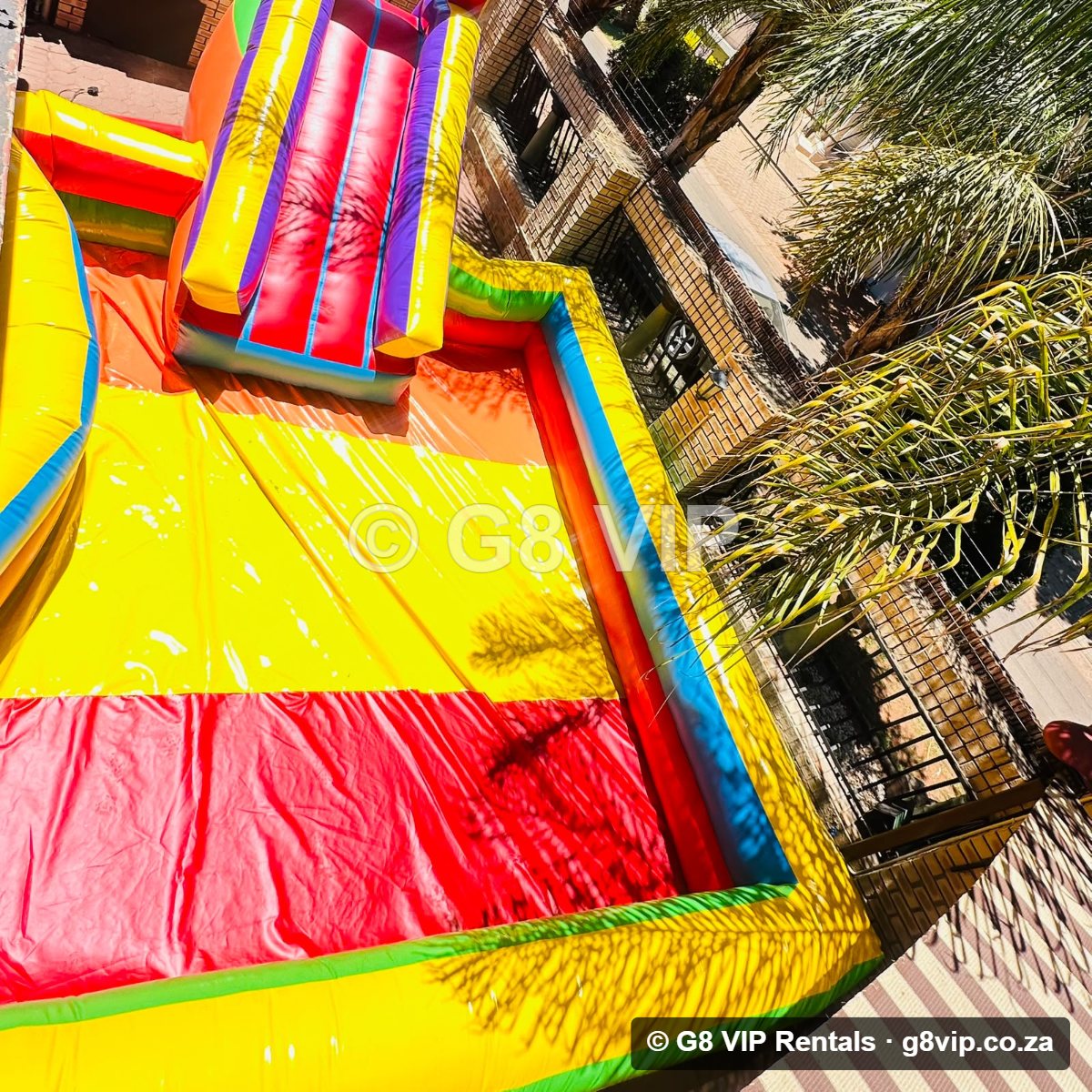 Slide & Pool Castle jumping castle with slide and pool - straight on